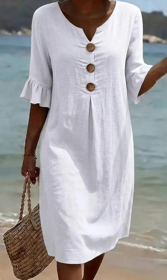 Linen dress with texture, puff sleeves, and buttons