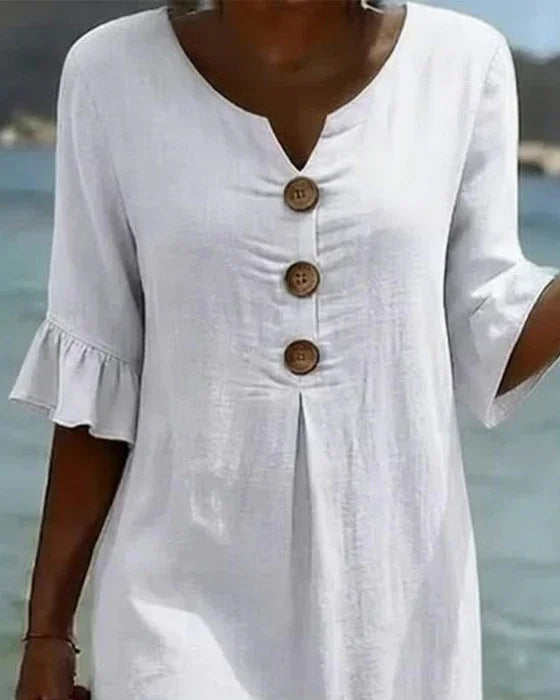 Linen dress with texture, puff sleeves, and buttons