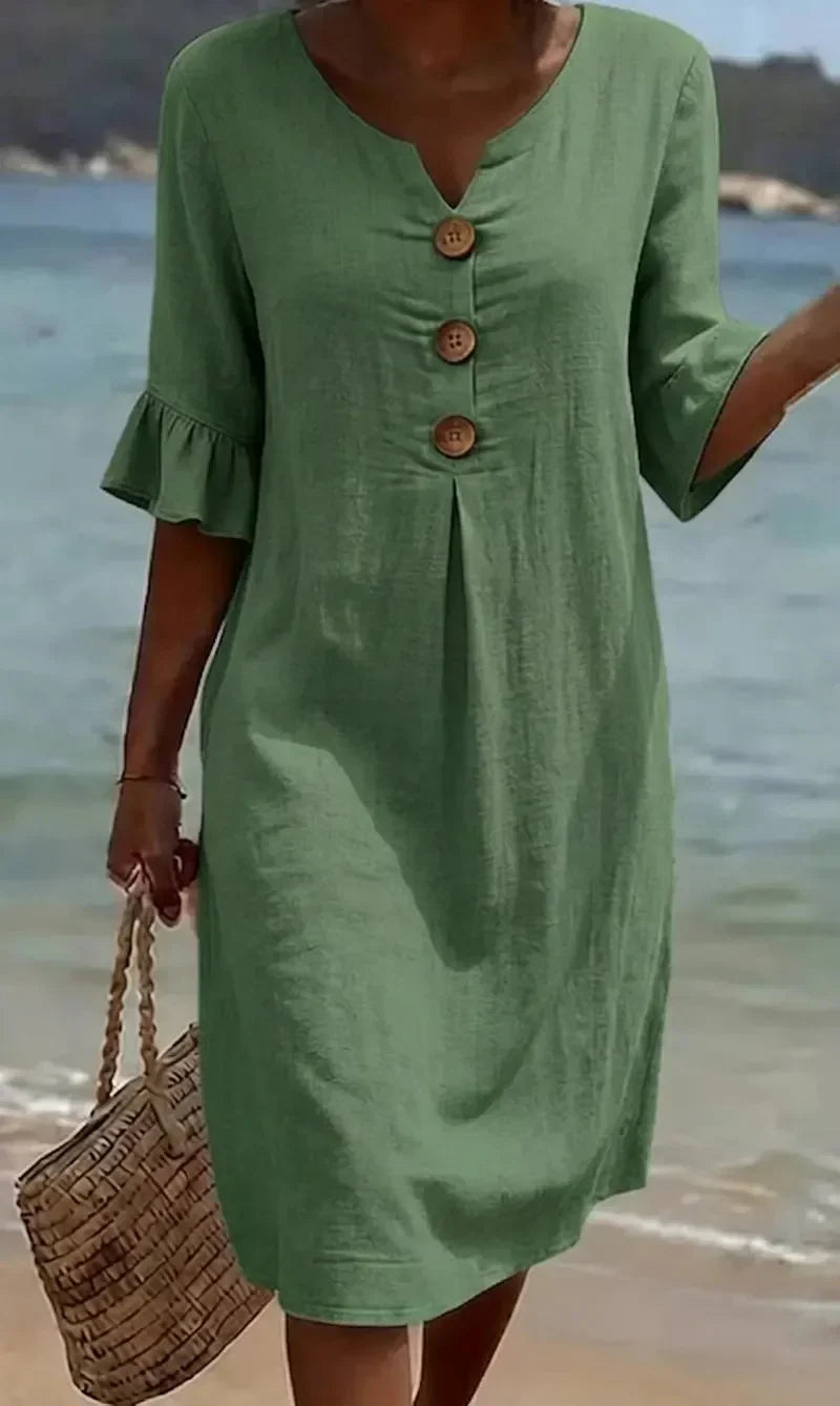 Linen dress with texture, puff sleeves, and buttons