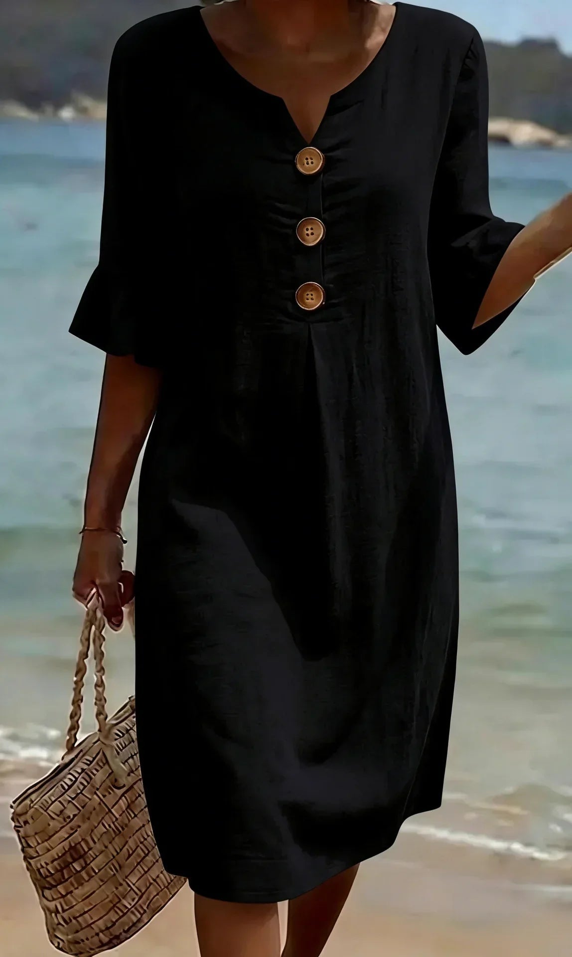 Linen dress with texture, puff sleeves, and buttons