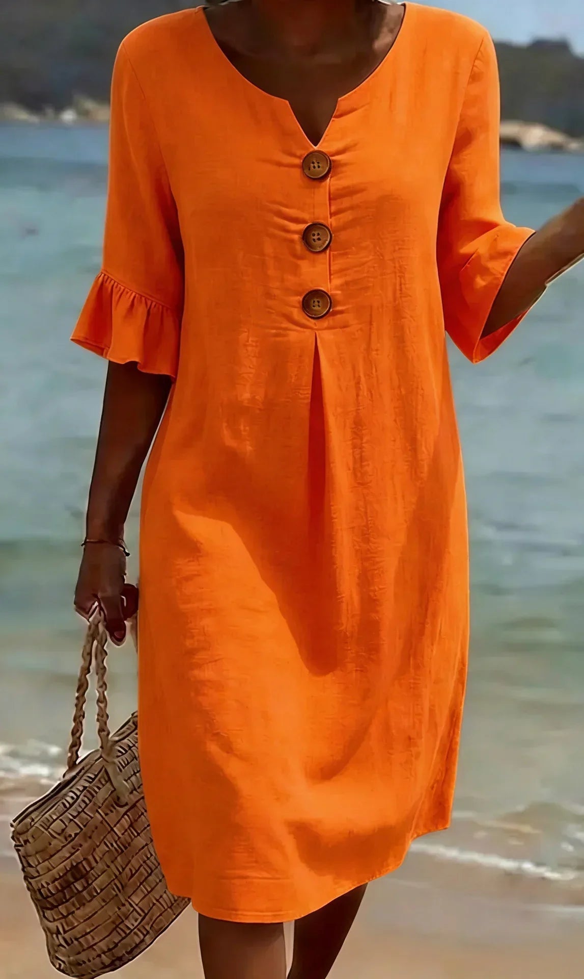 Linen dress with texture, puff sleeves, and buttons