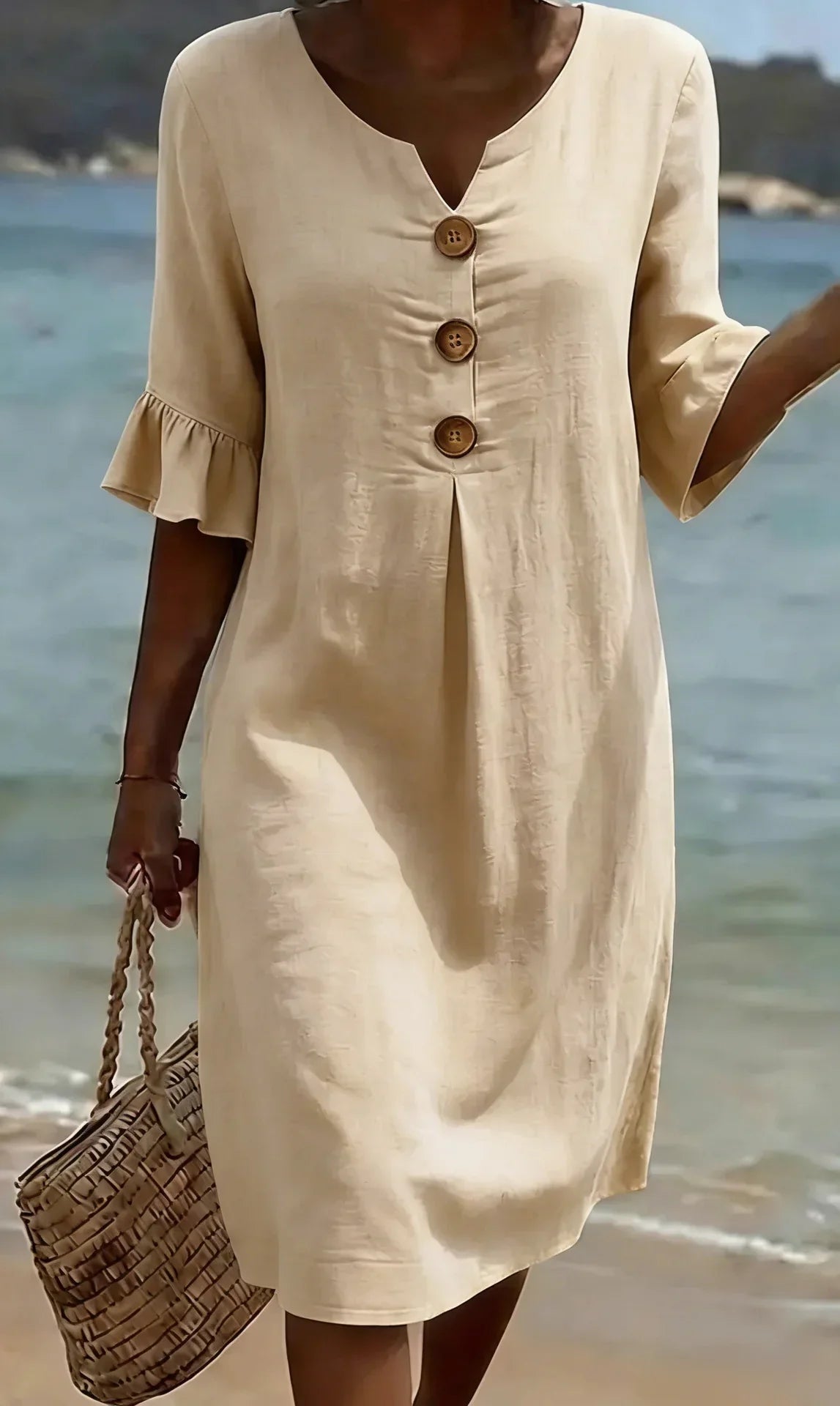 Linen dress with texture, puff sleeves, and buttons