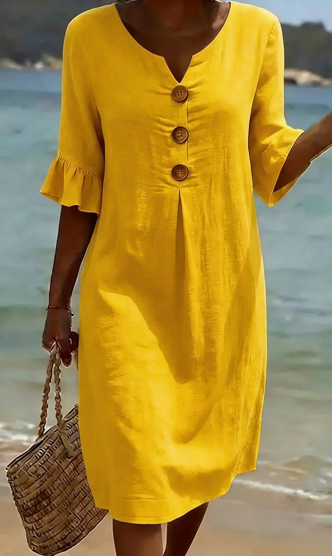 Linen dress with texture, puff sleeves, and buttons